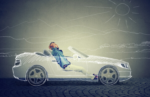 man in fake car